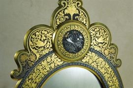 CW:  Remarkably detailed karat gold and oxidized silver inlay incorporating  central medallion cast with two birds.