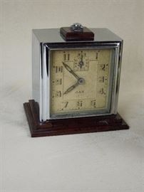 Highly collectible Jaz (France) Deco period chromed brass and Bakelite alarm clock.  Original condition and running order.  Circa 1930s.