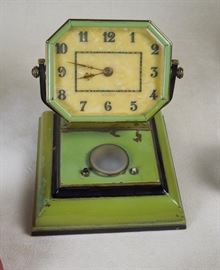 Highly unusual circa 1920-30 German 8-day bedside clock with on/off switches for battery powered lighting!  Original throughout.