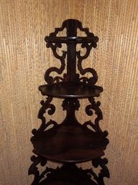 BAT:  Closeup illustrating dark purple and black painted grain simulating rosewood.  Original finish with only minor damage/repairs.