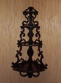 BAT:  Remarkable Victorian oversize corner whatnot shelves of drawn-grain rosewood.  American, circa 1860-70.  50" high x 22" max. wide (across lowermost shelf) x 17.5" max. deep