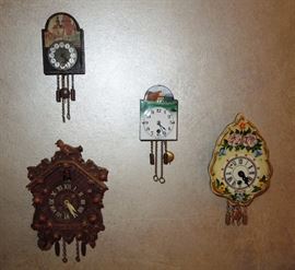 Assorted novelty clocks from Doug's collection - Lux cuckoo, Wintermantel 30-hour timepieces with rare fired enamel and hand painted wood dials.  Circa 1950-1980.