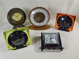Russian acrylic cased timepieces from the 1960s and early 70s.  Mid-Century modern walnut cased Westclox Scotland.  Lux world globe clock  circa 1950.  Bradley chrome and Bakelite desk clock with manual set "perpetual calendar."