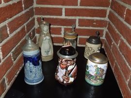 BAT & CW:   Selection of vintage German beer steins with pewter lids and thumbpieces. 