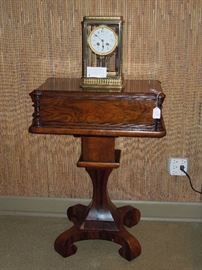 BAT:  American Classical rosewood side table with molded top, turned stiles, hourglass pedestal and concave platform base on scroll feet.  Circa 1840.  Fine condition and patina.  