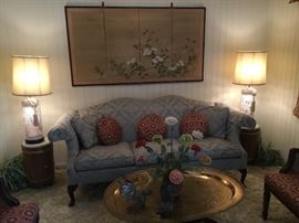 Queen Ann sofa, pair of blanc de chine lamps with inside lights, pair of round tables
