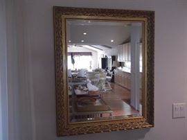 Beveled mirror with wood frame