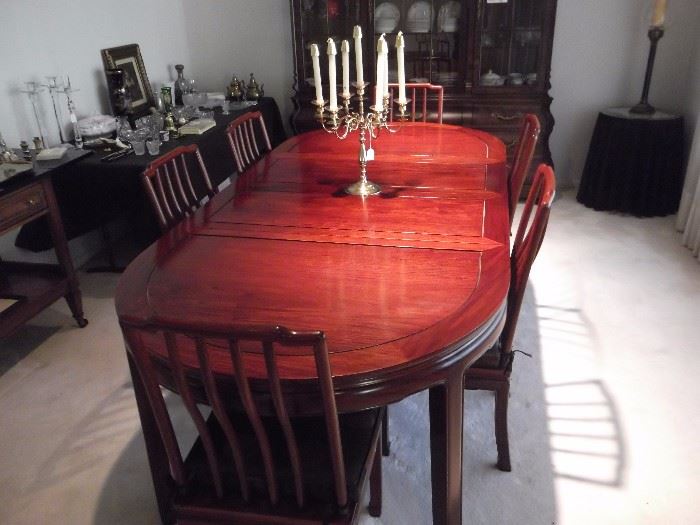 Beautiful Mahogany dining room set with 6 chairs, 2 leaves, and custom table pads which were always used.
