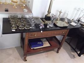 Excellent serving cart with double extensions and wheels for easy use.