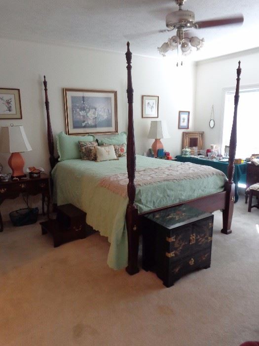 Queen size Mahogany rice carved bed,perfect condition, comes without mattress  and box springs, which can be purchased separately.  They are in near perfect condition.