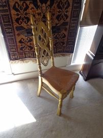 One of a set of 6 side chairs with rush seats and painted