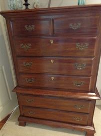 A tall mahogany chest in great condition