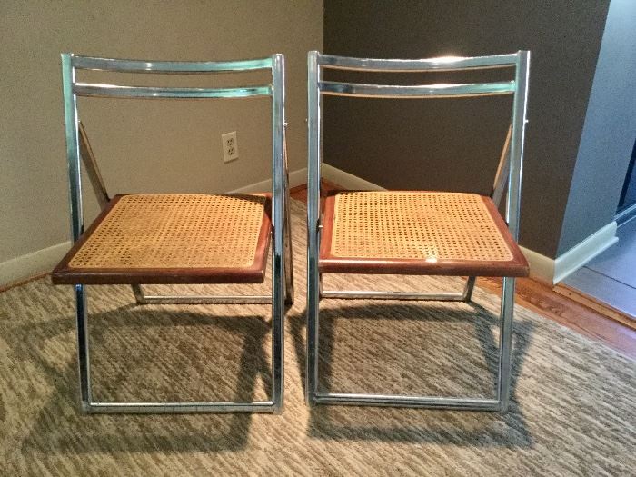 Midcentury Modern folding cane bottom chairs, steel frame. Set of two.