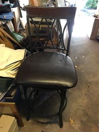 A pair of counter height chairs