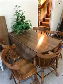 Drop leaf Maple table with 6 chairs and 2 leaves
