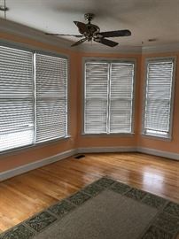 Blinds, fan and hardwood flooring is for sale.  