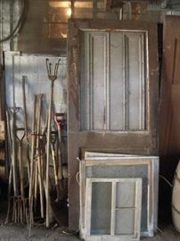 several old interior doors , yard tools