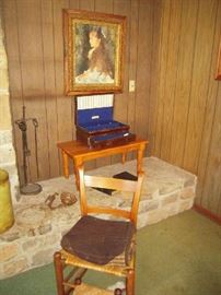 nice framed picture, oak table, flatware