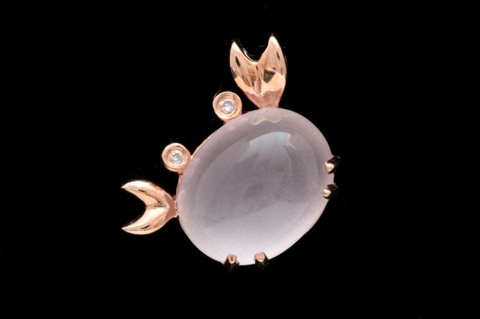 LaBell 14K Rose Gold, Rose Quartz, and Diamond Crab Pendant: A LaBell 14K rose gold, rose quartz and diamond crab pendant. The pendant features an oval rose quartz cabochon set in a 14K rose gold mounting. The rose quartz serves as the crab’s body while two round brilliant cut diamonds are set as the crabs eyes. The crab is finished with two 14K rose gold claws; one of which serves as the pendant’s bail.