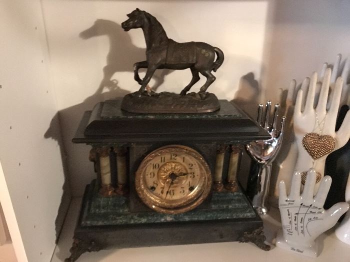 Seth Thomas clock. Horse is separate but I love the way it looks on top!!