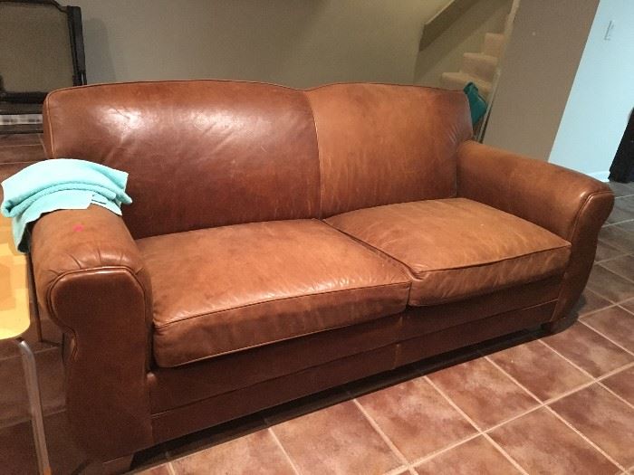 Well worn yet perfect leather sofa
