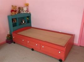 Children's bed on wheels with three large, built in storage drawers. Includes Headboard and mirror. - $200