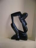 carved wood "thinker"
