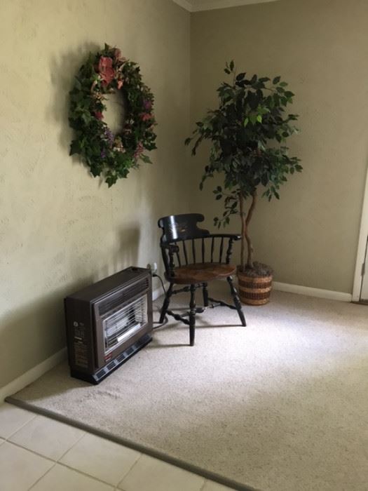 Space Heater, wood chair, silk ficus tree wreath