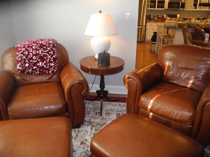 Very comfy leather club chairs with ottomans!