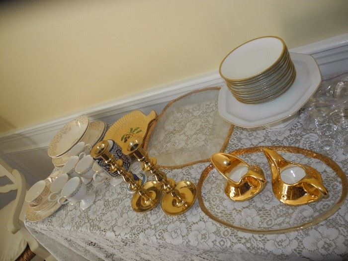 Lots of gold and white, brass candlesticks, 24 carat plated set