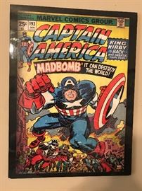 Framed comic artwork.