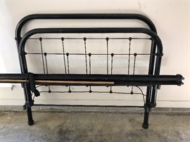 Antique iron bed with rails and mattress slats. Also another vintage metal bed. Both full size.