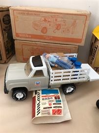The Chevron Tonka Tanker Truck (say that 3 times fast...in top box) is in the original UNOPENED box!  