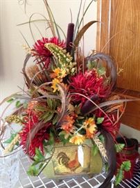 Colorful arrangement in rooster container