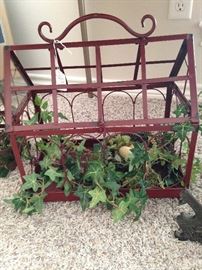 Decorative cage, greenery, and nest