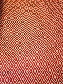 5 feet by 7 feet red and cream rug