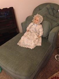 Chaise lounge and vintage doll