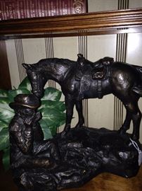 Cowboy and horse statue