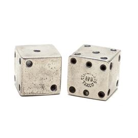 Taxco Mexican Sterling Silver Dice: A pair of Taxco Mexico sterling silver dice. The two small die are dotted with numbers one through six. The number six side is stamped with “Sterling 925 Taxco APB”. The sterling silver content weighs approximately 0.390 ozt.