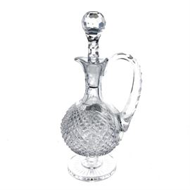 Waterford Crystal Prestige Collection Claret Decanter With Stopper: A Waterford Crystal Prestige Collection claret wine decanter with stopper. The handled decanter has a faceted ball stopper and features an incised diamond pattern to the body, standing on a footed base. The base bears a Waterford acid etched maker’s mark.