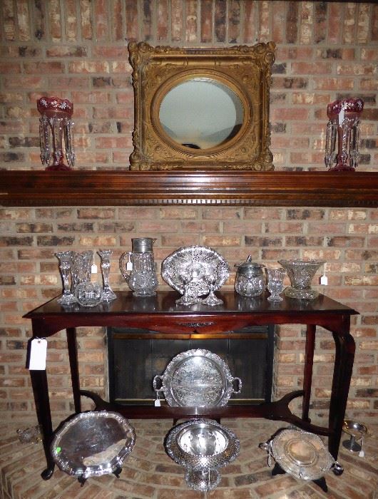 Silverplate serving pieces, Mahogany Sofa Table, Enameled Cranberry Glass Lusters, Antique framed mirror
