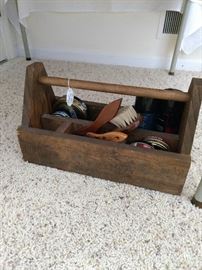 Old shoeshine kit.  Love the wood box!