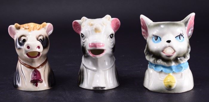 Lot 62: Two Cow & One Cat Head Creamers
