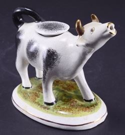 Lot 64: Cow Creamer w/Cover on Oval Grassy Base