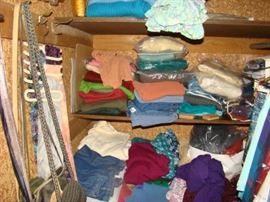 Designer sweaters, purses, belts.