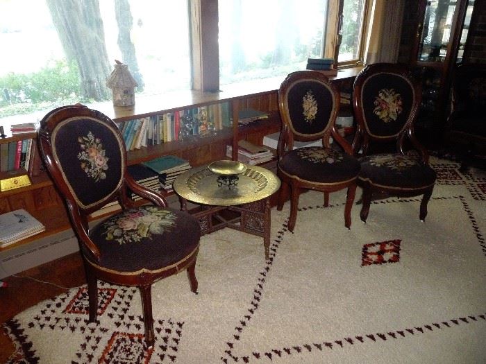 needlepoint side chairs / brass top round table