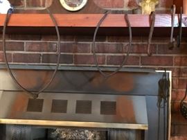 Antique cast iron tongs and hooks.