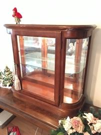 Lighted Curio cabinet, so cute.