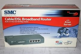 SMC NETWORKS SMC7004ABR CABLE/DSL BROADBAND ROUTER BUILT IN 4 

PORT 10/100 MBPS SWITCH