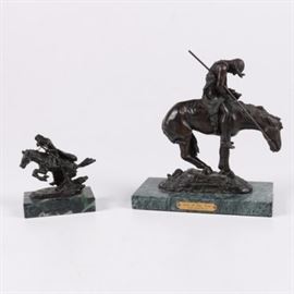 American West Themed Bronze Figures Including After Remington: A pair of bronze American west themed figures. Included is a figure after the sculpture titled The Cheyenne by Frederic Remington. Also included is a figurine after the sculpture titled End of the Trail by James Earl Fraser. Both are composed of cast bronze and are presented on green marble bases.